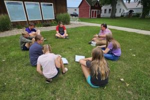 Professional educator leading group
